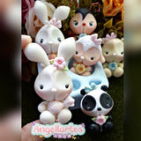Conejitos y animalitos en porcelana fría con estilo dulce realizados con molde Angela Moldes, ideales para baby shower y decoración infantil.
