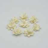 Pack de 8 flores de color blanco de porcelana fría